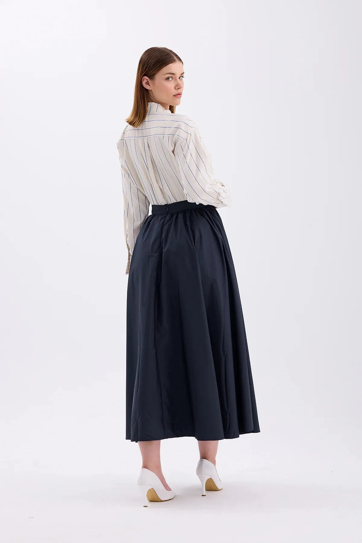 PLEATED NAVY BLUE SKIRT